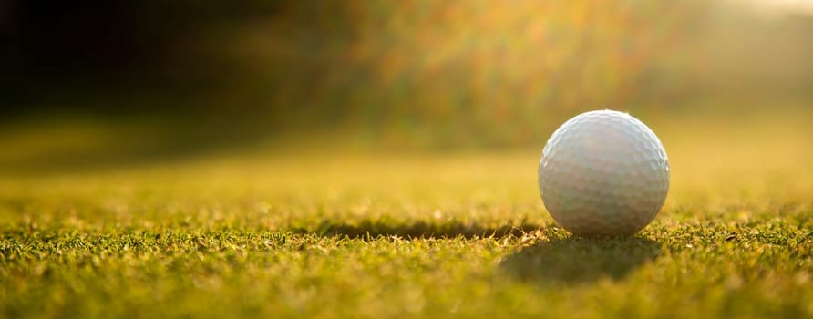 Golf ball, course on a sunny day