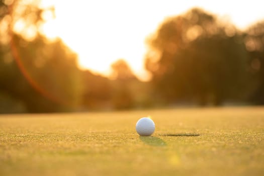 Golf ball, course on a sunny day