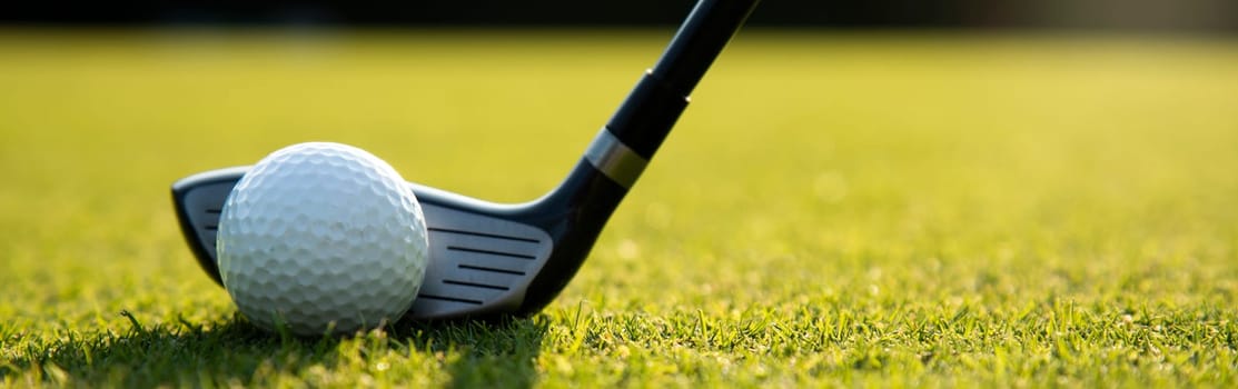 Golf player playing in a golf club on a beautiful sunset in the evening