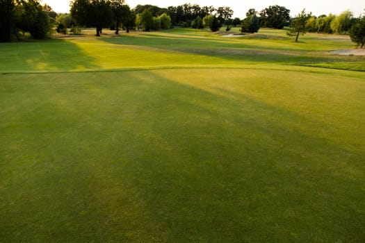 Golf course with green grass