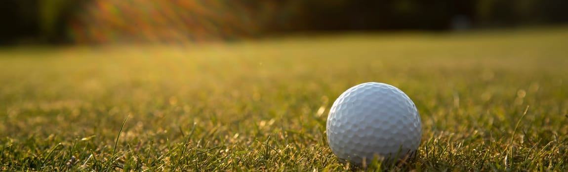 Golf course with ball and grass