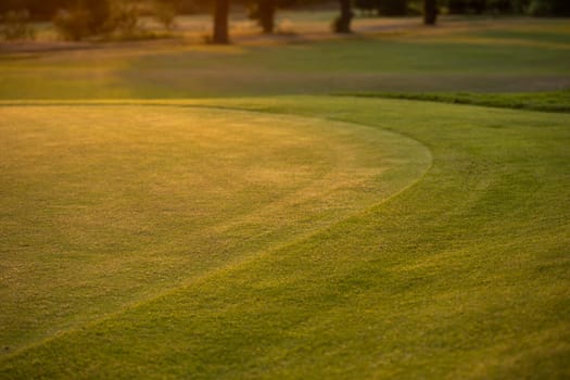 Golf course with green grass