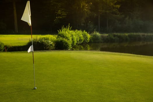 Golf course with green grass