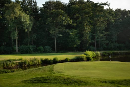 Golf course with green grass