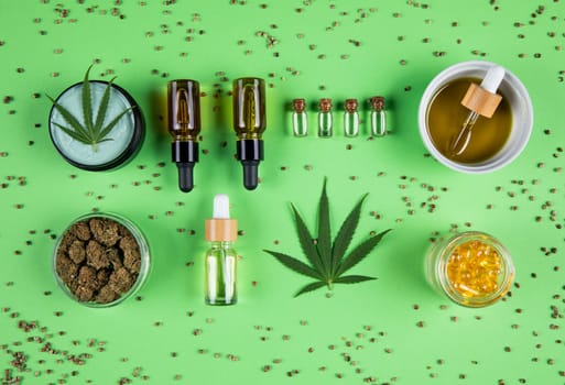 Marijuana buds with cannabis leaves on cbd concept