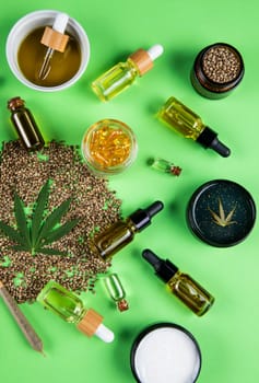 Marijuana buds with cannabis leaves on cbd concept
