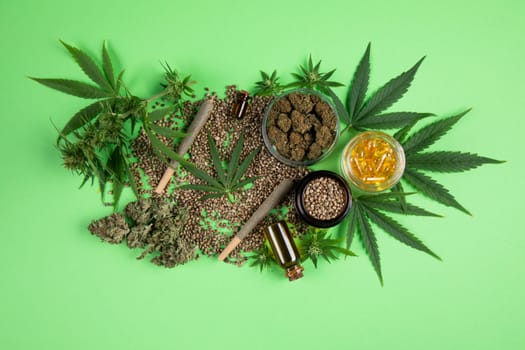 Marijuana buds with cannabis leaves on cbd concept