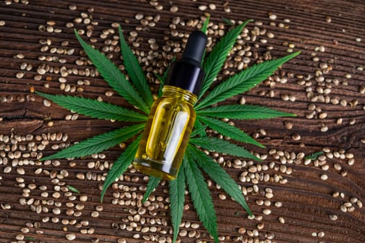 Cbd oil and marijuana plant, hemp seeds, medical marijuana concept