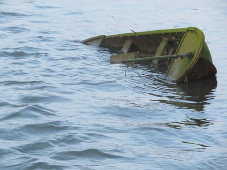old ancient boat sunken in poor condition abandoned