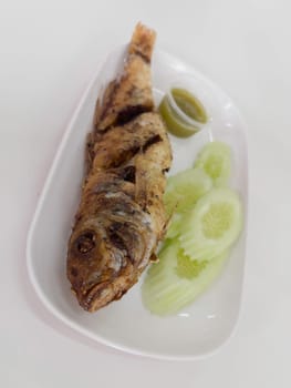 Thai food deep fried fish with seafood sauce, stock photo