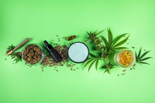 Marijuana buds with cannabis leaves on cbd concept