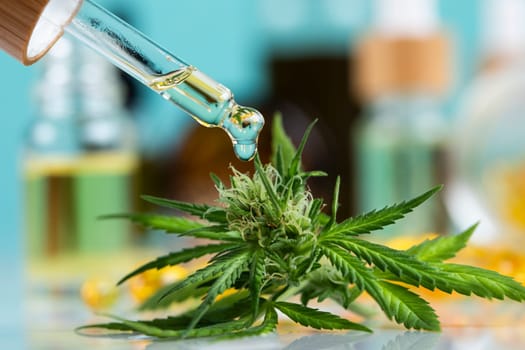 Set of essential oil cbd in a glass bottle, with a pipette, marijuana concept