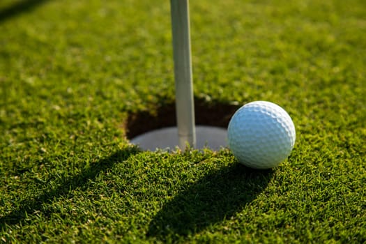 Sport and lifestyle, Golf ball on green grass on course