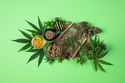 Marijuana buds with cannabis leaves on cbd concept