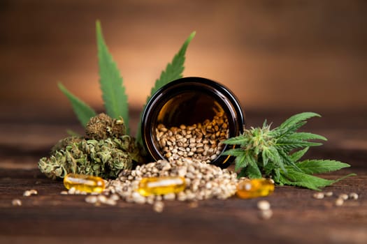 Hemp oil and marijuana leaves on extract cbd