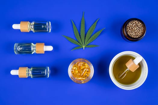 Marijuana buds with cannabis leaves on cbd concept