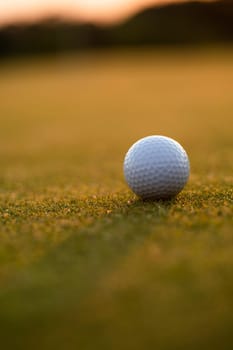 Golf course with ball and grass