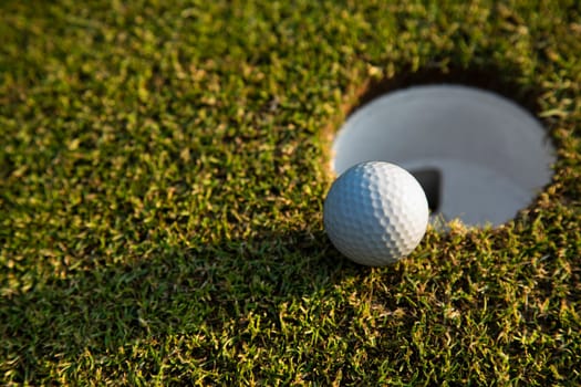 Sport and lifestyle, Golf ball on green grass on course