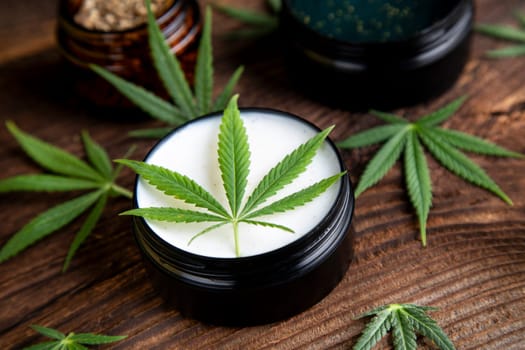 Cbd hemp cosmetics, oil in bottle and marijuana