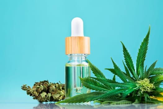 Hemp oil and marijuana leaves on extract cbd