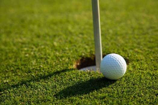 Sport and lifestyle, Golf ball on green grass on course