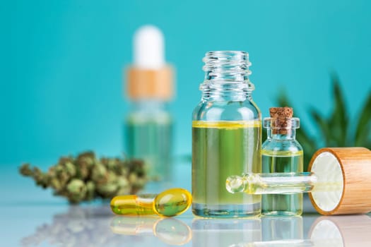Hemp cbd oil, cannabis leaves, hemp seeds and bottles of oil