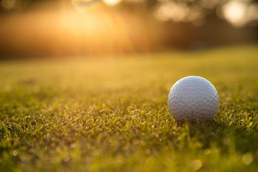 Golf ball, course on a sunny day