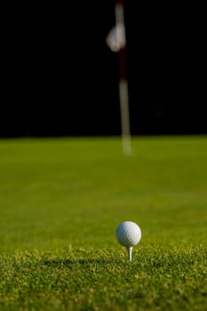 Golf course with ball and grass