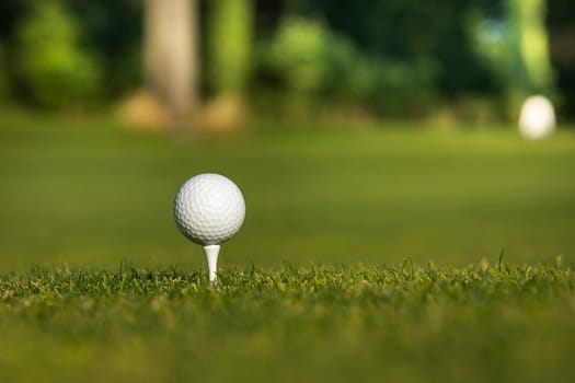 Golf course with ball and grass