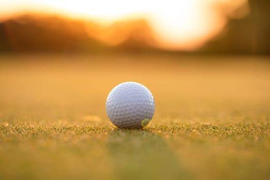 Golf course with ball and grass