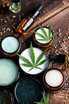 Cbd hemp cosmetics, oil in bottle and marijuana