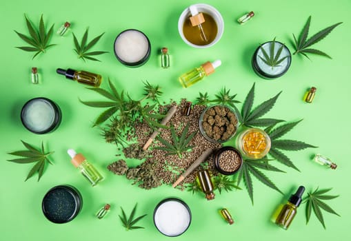 Marijuana buds with cannabis leaves on cbd concept