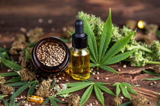 Cbd oil and marijuana plant, hemp seeds, medical marijuana concept