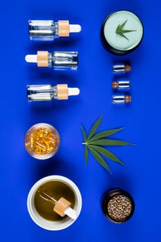 Marijuana buds with cannabis leaves on cbd concept