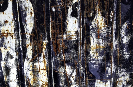 Detail of old dirty and damaged metal wall, rust