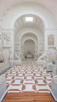 Possagno, Italy - June 2022: Antonio Canova Museum. Gallery interior with antique collection of statues