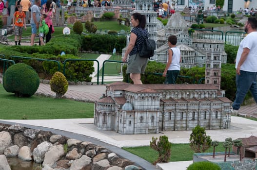 Viserba, Italy - June 25, 2024: People going at Theme park Italy in Miniature or Italia in Miniatura in Rimini, Italy - Reproduction of famous attractions in a small scale