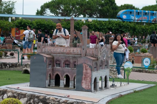 Viserba, Italy - June 25, 2024: People going at Theme park Italy in Miniature or Italia in Miniatura in Rimini, Italy - Reproduction of famous attractions in a small scale