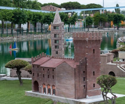 Viserba, Italy - June 25, 2024: Pomposa Abbey in Ferrara at Theme park Italy in Miniature or Italia in Miniatura in Rimini, Italy - Reproduction of famous attractions in a small scale
