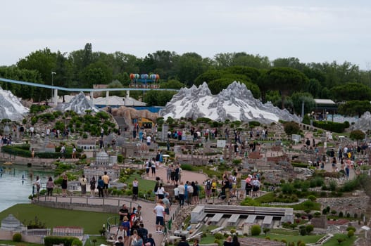 Viserba, Italy - June 25, 2024: People going at Theme park Italy in Miniature or Italia in Miniatura in Rimini, Italy - Reproduction of famous attractions in a small scale