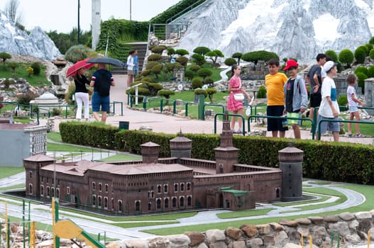 Viserba, Italy - June 25, 2024: People going at Theme park Italy in Miniature or Italia in Miniatura in Rimini, Italy - Reproduction of famous attractions in a small scale
