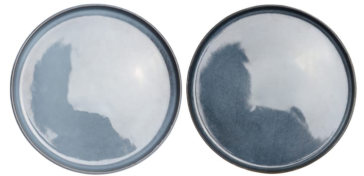 Empty blue ceramic plate on isolated background, top view. Set