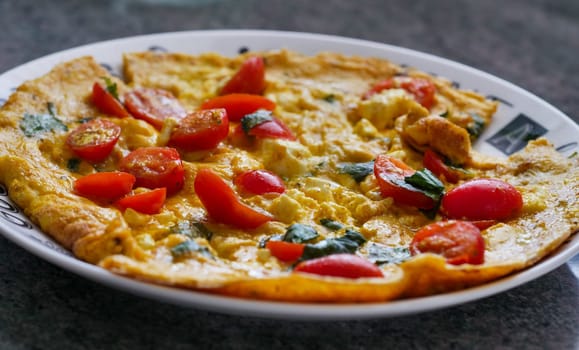 omelet with cherry tomatoes