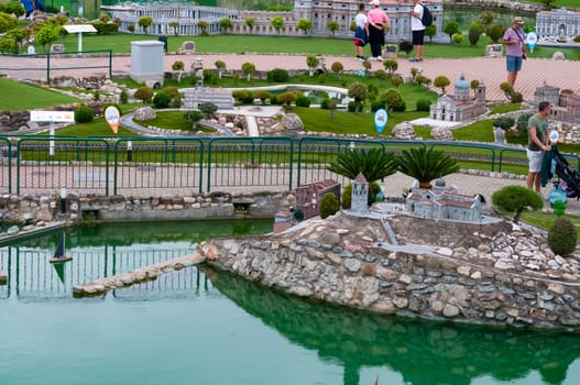 Viserba, Italy - June 25, 2024: People going at Theme park Italy in Miniature or Italia in Miniatura in Rimini, Italy - Reproduction of famous attractions in a small scale