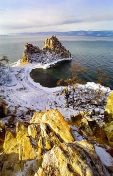 Winter on the Baikal, ice and snow on the lake. The beauty of the nature of Baikal in winter.