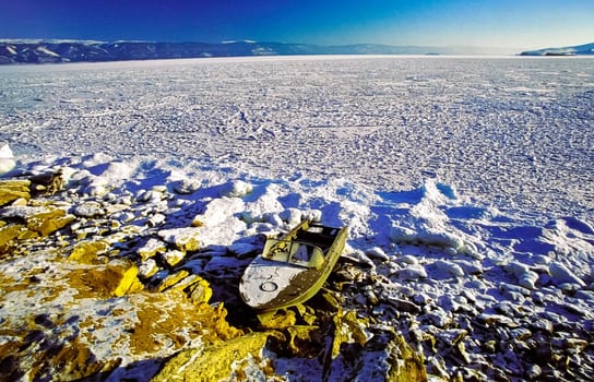 Winter on the Baikal, ice and snow on the lake. The beauty of the nature of Baikal in winter.