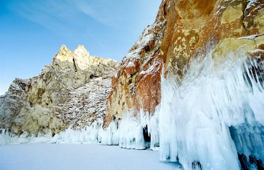 Winter on the Baikal, ice and snow on the lake. The beauty of the nature of Baikal in winter.