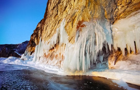 Winter on the Baikal, ice and snow on the lake. The beauty of the nature of Baikal in winter.