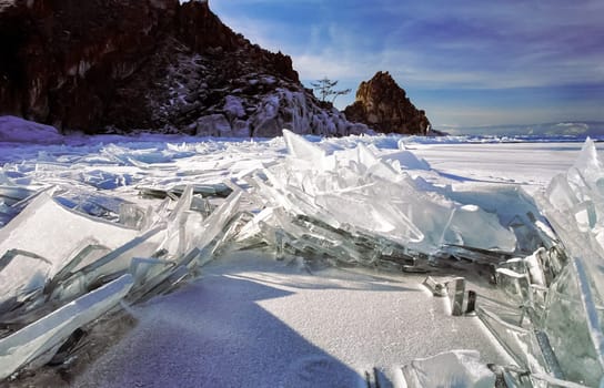 Winter on the Baikal, ice and snow on the lake. The beauty of the nature of Baikal in winter.