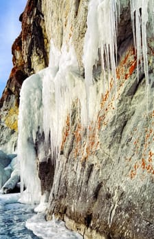 Winter on the Baikal, ice and snow on the lake. The beauty of the nature of Baikal in winter.
